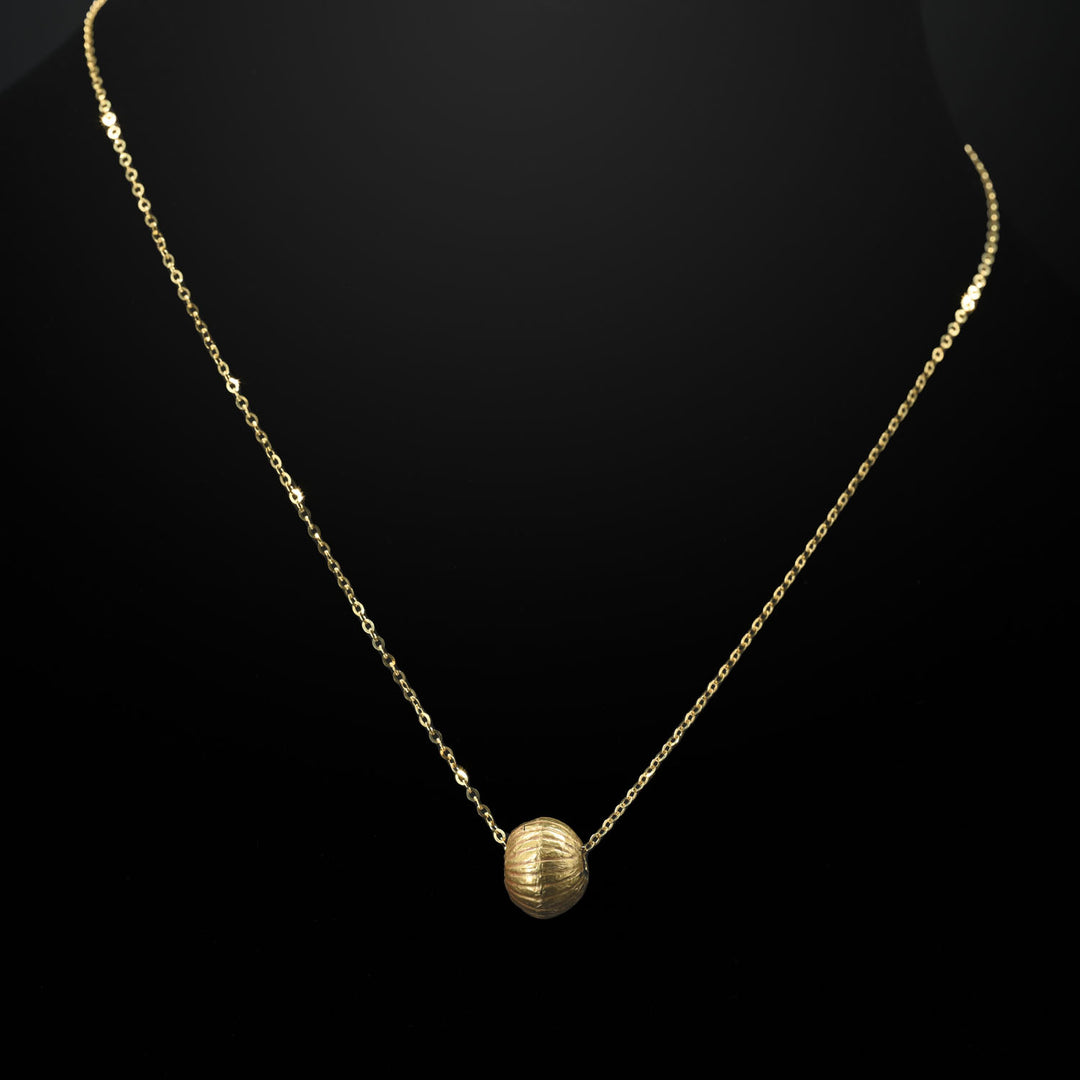 A Greek Gold Bead Pendant, Hellenistic Period, ca. 3rd - 1st century BCE