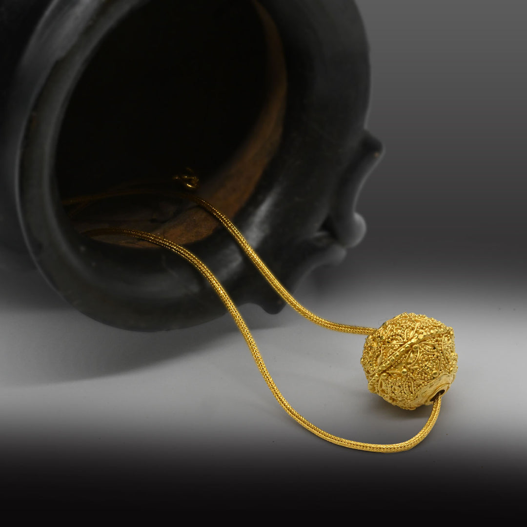 A Greek Gold Filigree Bead, Hellenistic Period, ca. 3rd - 1st century BCE