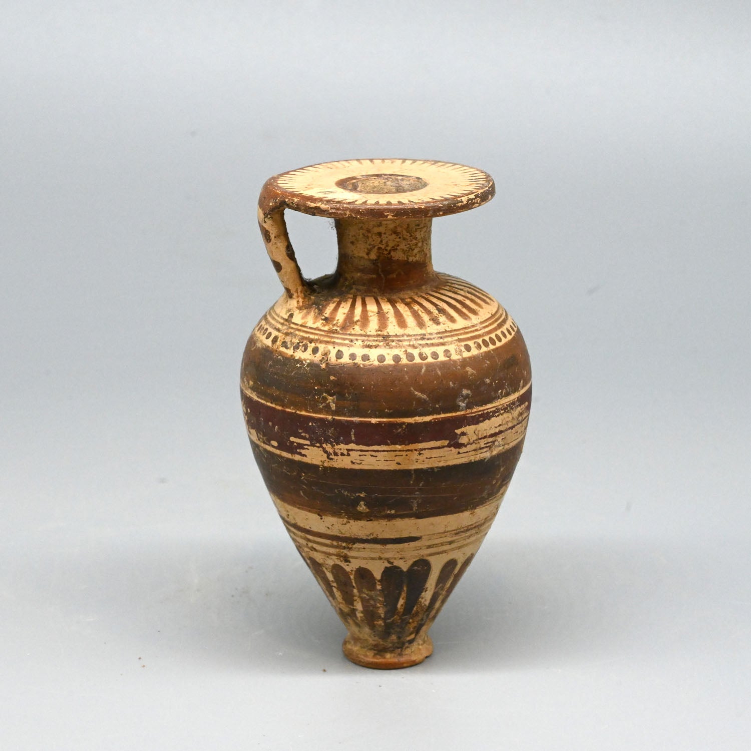 An Etrusco-Corinthian Piriform Aryballos, ca. 6th century BCE