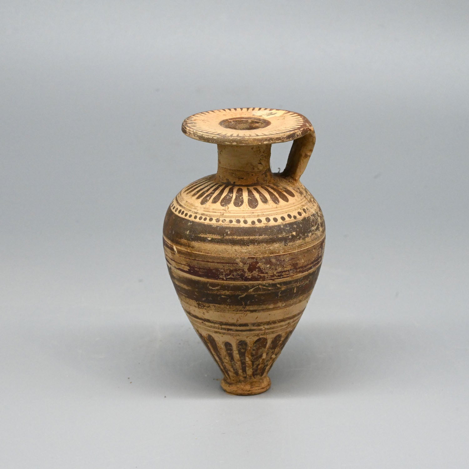 An Etrusco-Corinthian Piriform Aryballos, ca. 6th century BCE