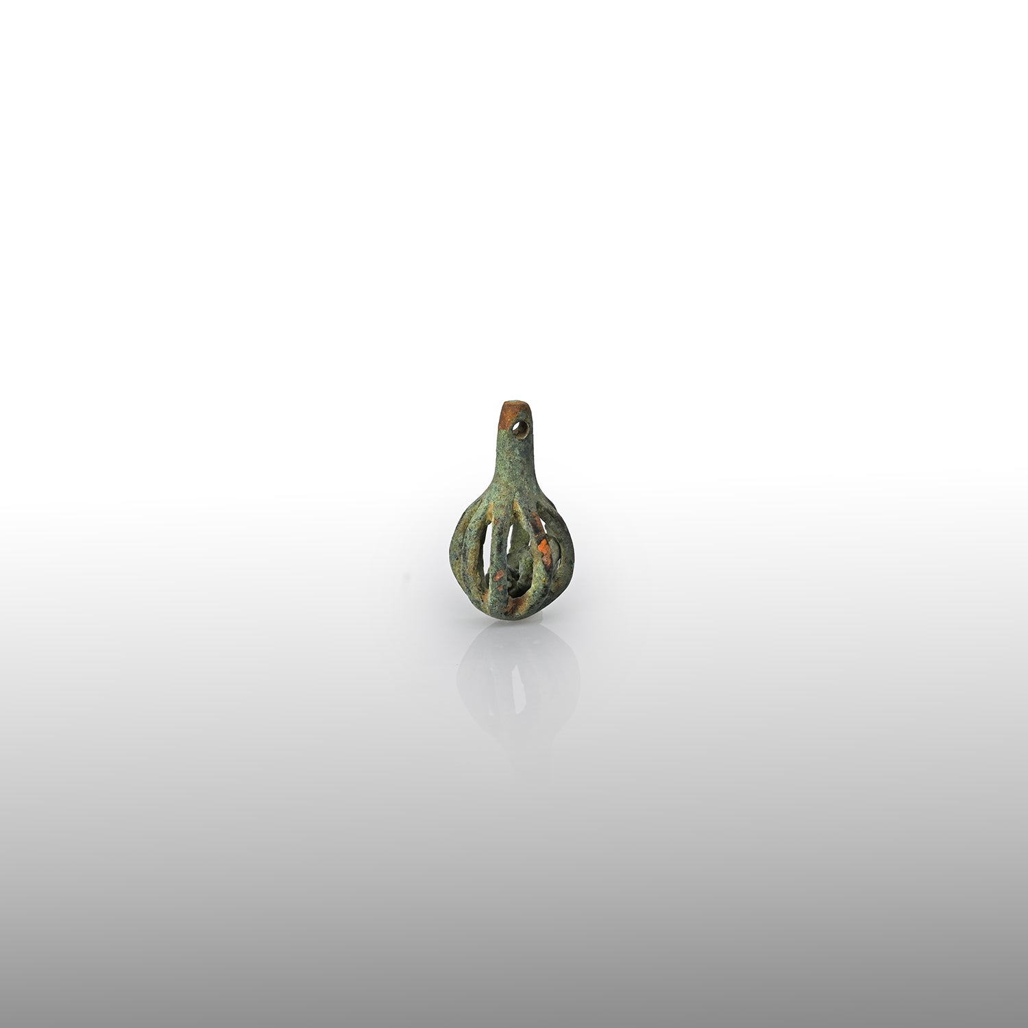 A small Luristan bronze openwork Harness Bell, ca. 1000 – 700 BCE