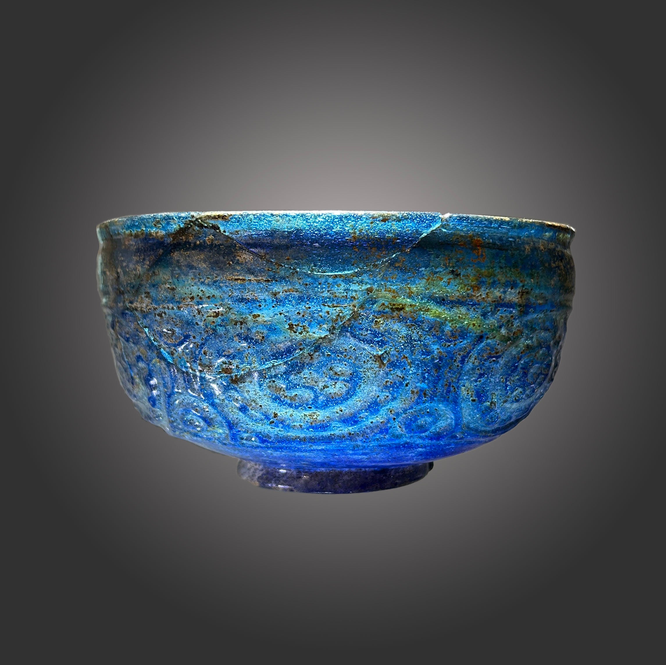 A Rare Islamic Molded Cobalt Blue Glass Bowl, Early Islamic Period, ca. 7th - 10th century CE