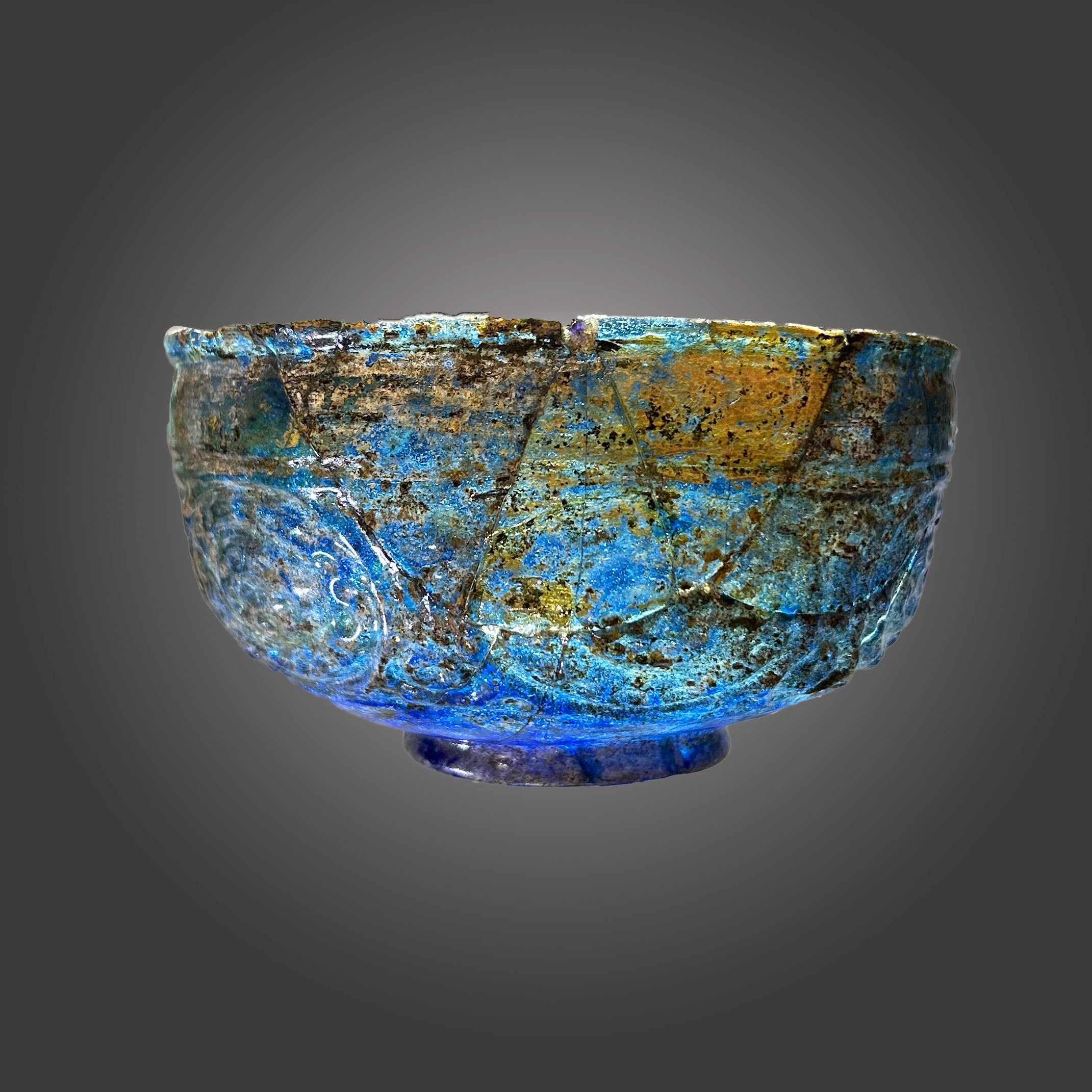 A Rare Islamic Molded Cobalt Blue Glass Bowl, Early Islamic Period, ca. 7th - 10th century CE