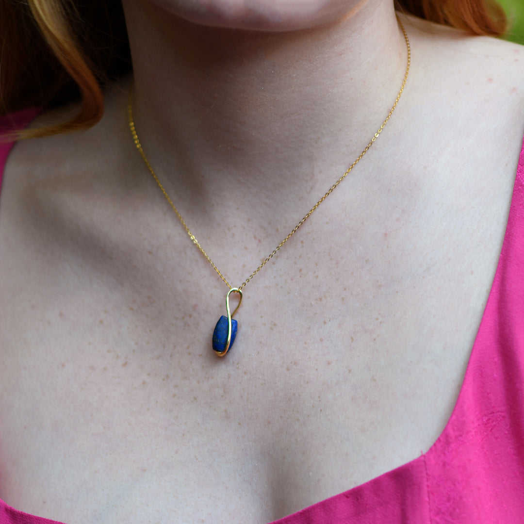 A Neo-Assyrian Lapis Lazuli Bead Pendant, Neo Assyrian Period, ca. 911 - 609  BCE