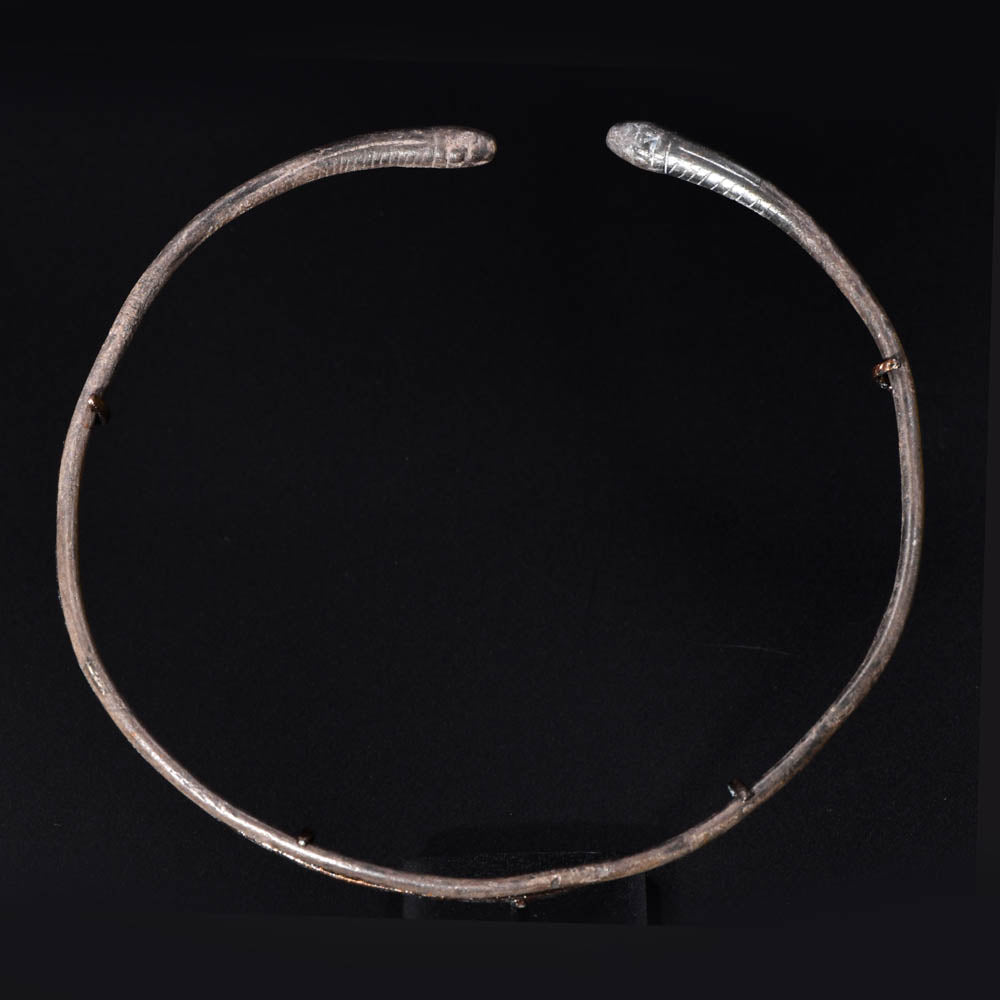 A Near Eastern Bronze Snake Head Torque, Parthian Period, ca. 247 BCE