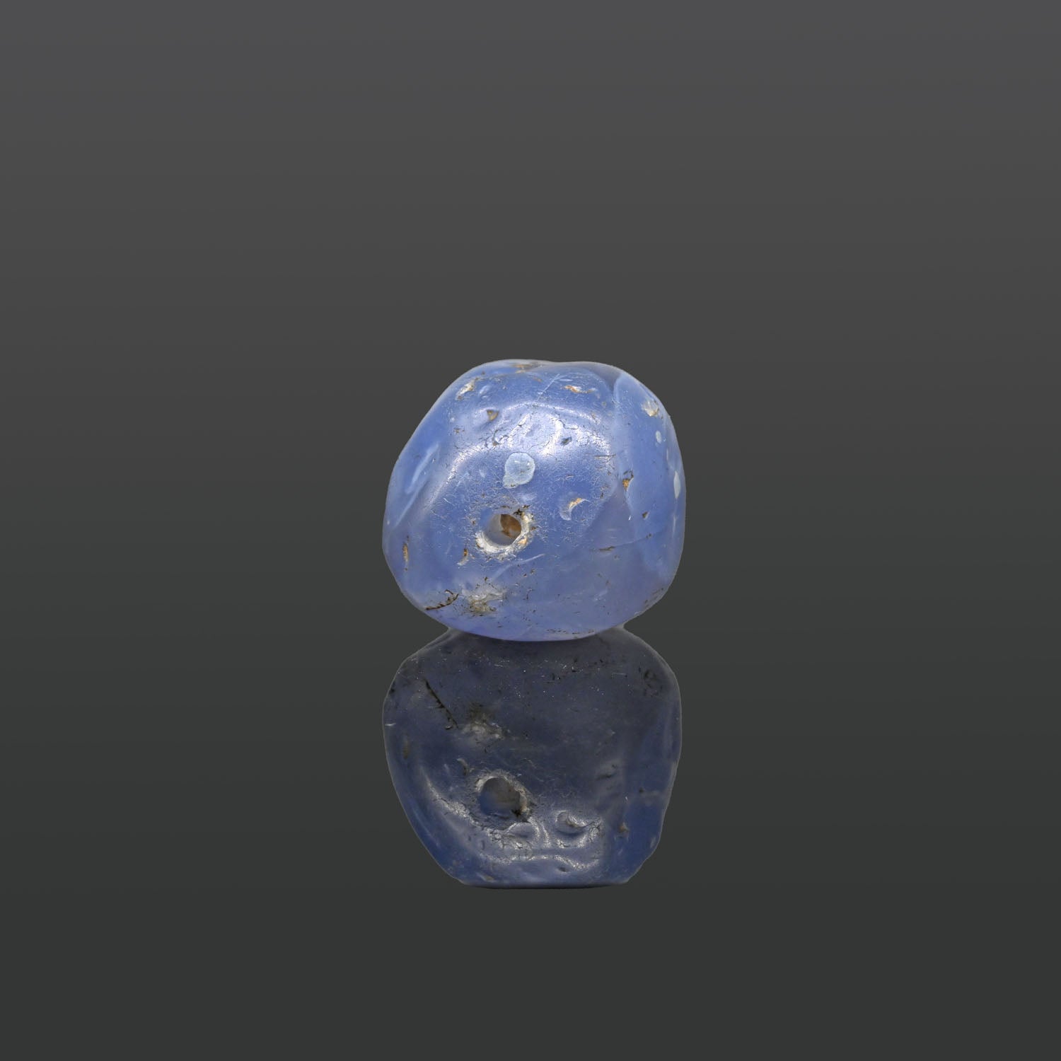 A large Sasanian Blue Chalcedony Bead, ca. 4th - 5th century CE