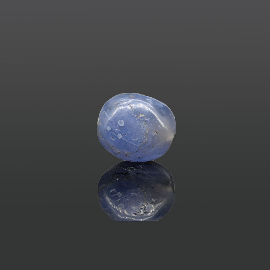 A large Sasanian Blue Chalcedony Bead, ca. 4th - 5th century CE