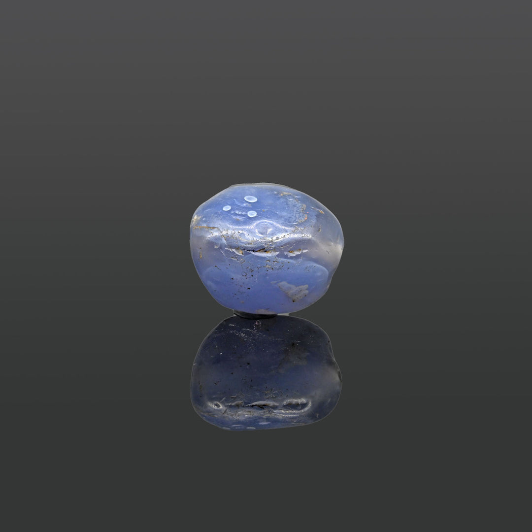 A large Sasanian Blue Chalcedony Bead, ca. 4th - 5th century CE