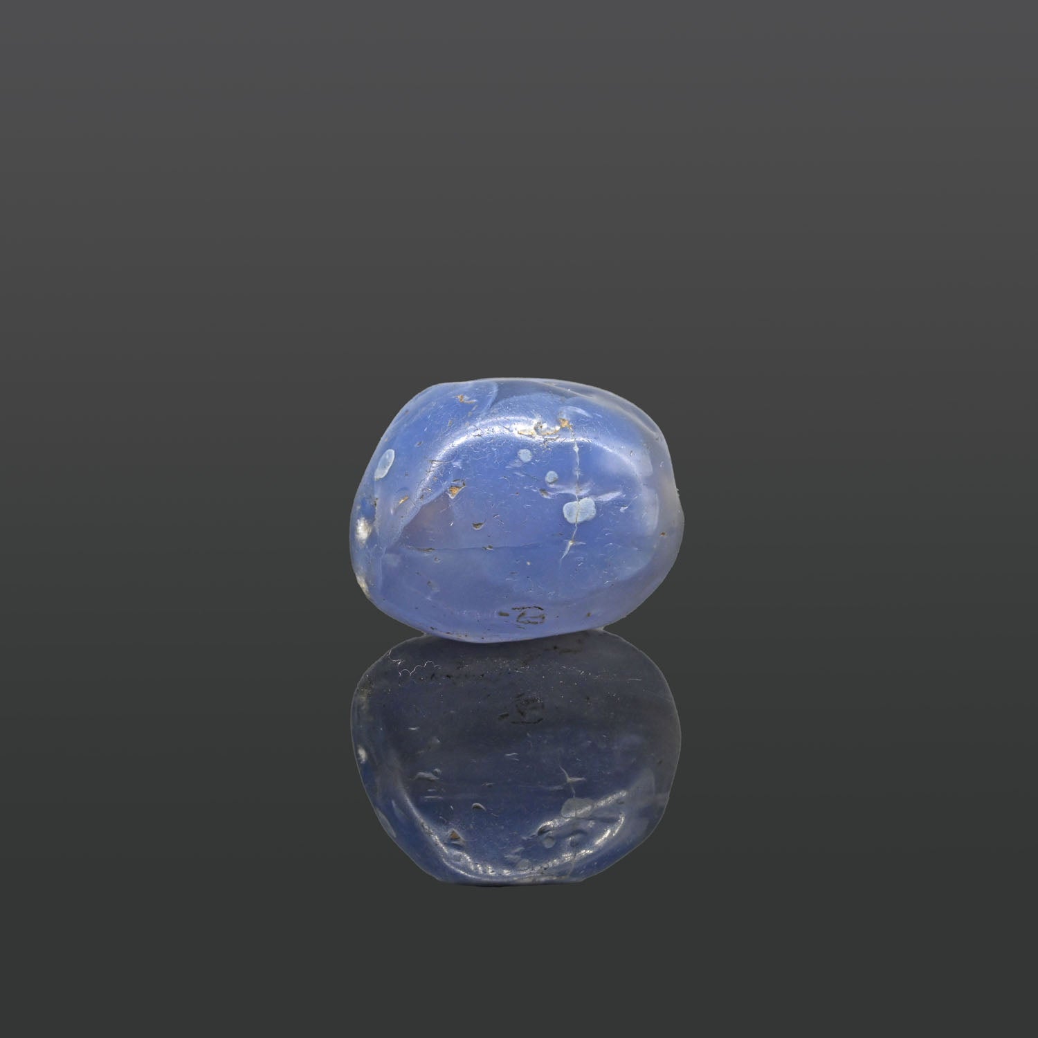 A large Sasanian Blue Chalcedony Bead, ca. 4th - 5th century CE
