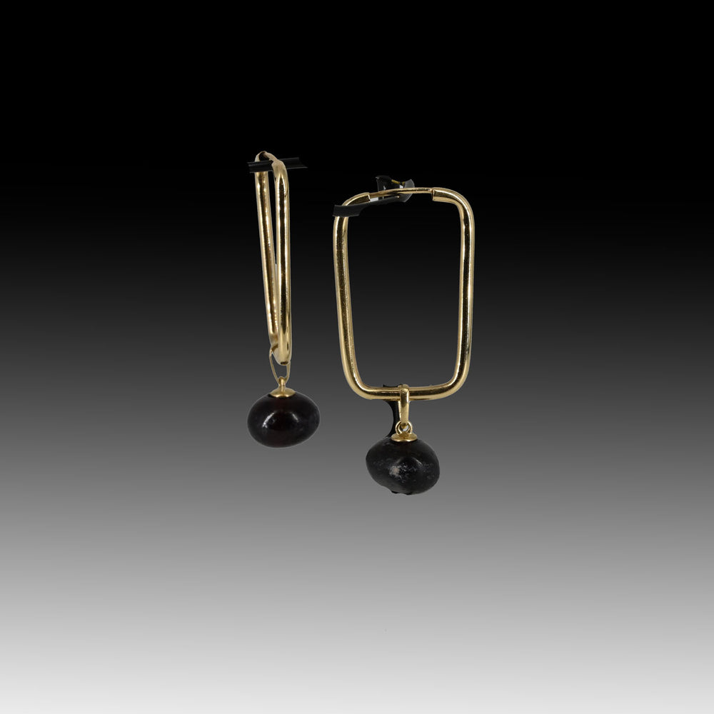 A Pair of Persian Garnet Beads set as earrings, Achaemenid Empire, ca. 550 - 330 BCE
