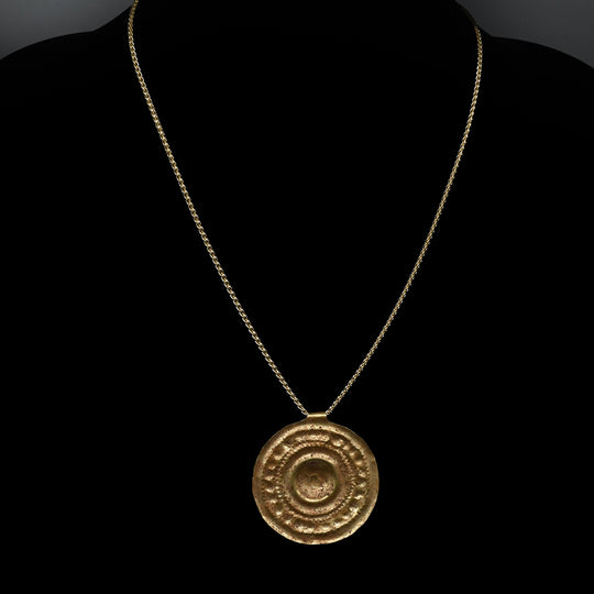 A large Western Asiatic Gold Disk Pendant, ca late 2nd Millennium BCE