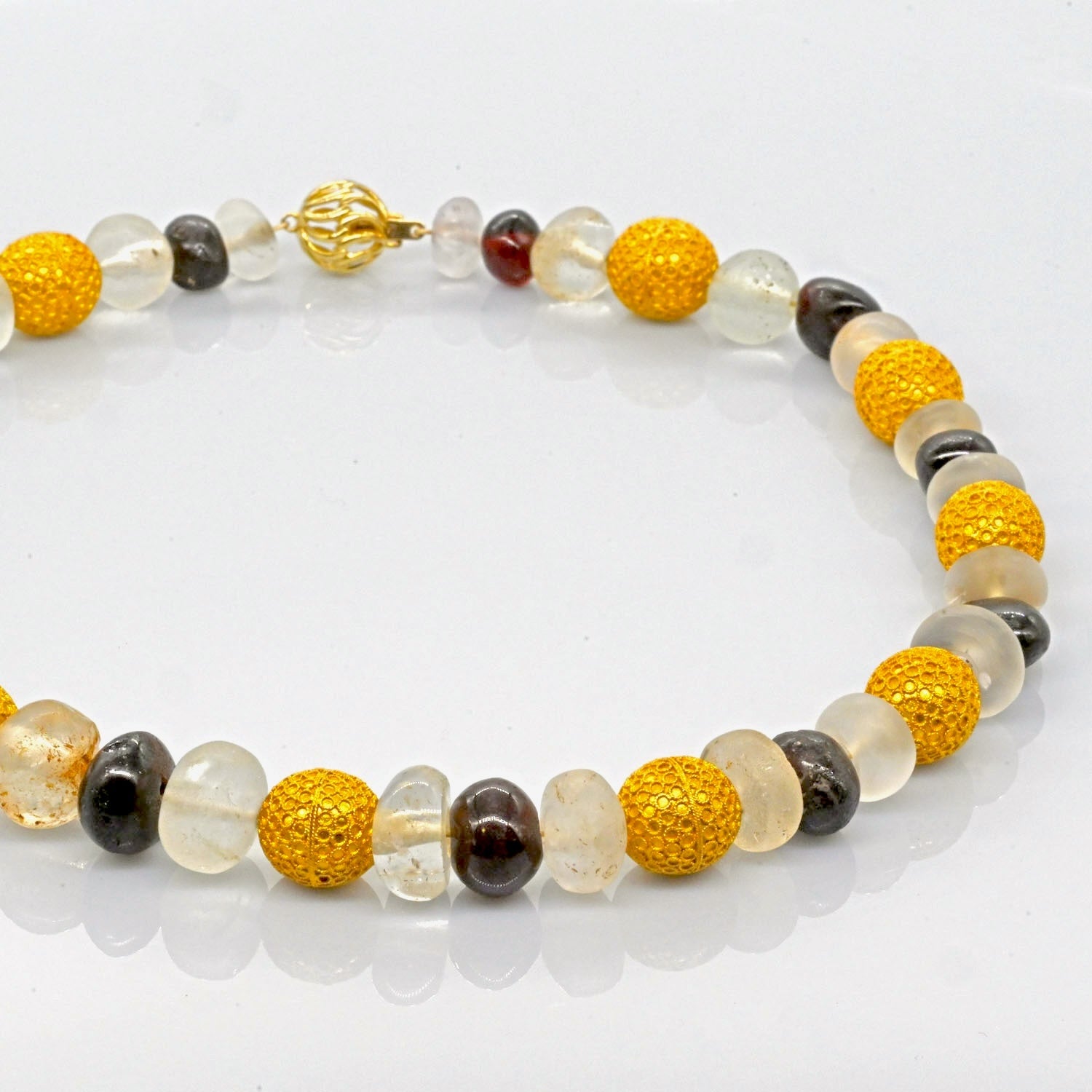 An Elegant Byzantine Gold, Quartz and Garnet Bead Necklace, ca. 9th century CE