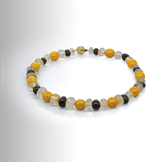 An Elegant Byzantine Gold, Quartz and Garnet Bead Necklace, ca. 9th century CE