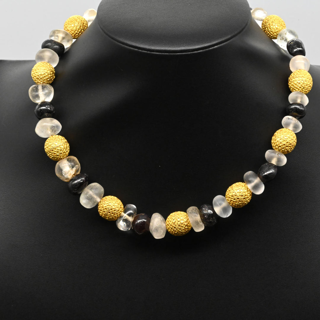 An Elegant Byzantine Gold, Quartz and Garnet Bead Necklace, ca. 9th century CE