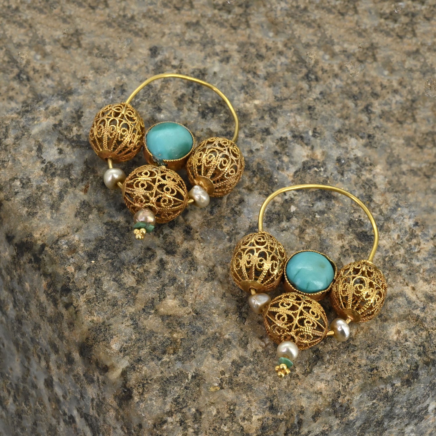 An exceptional pair of Islamic Gold, Turquoise, and Pearl Earrings, ca. 10th century CE