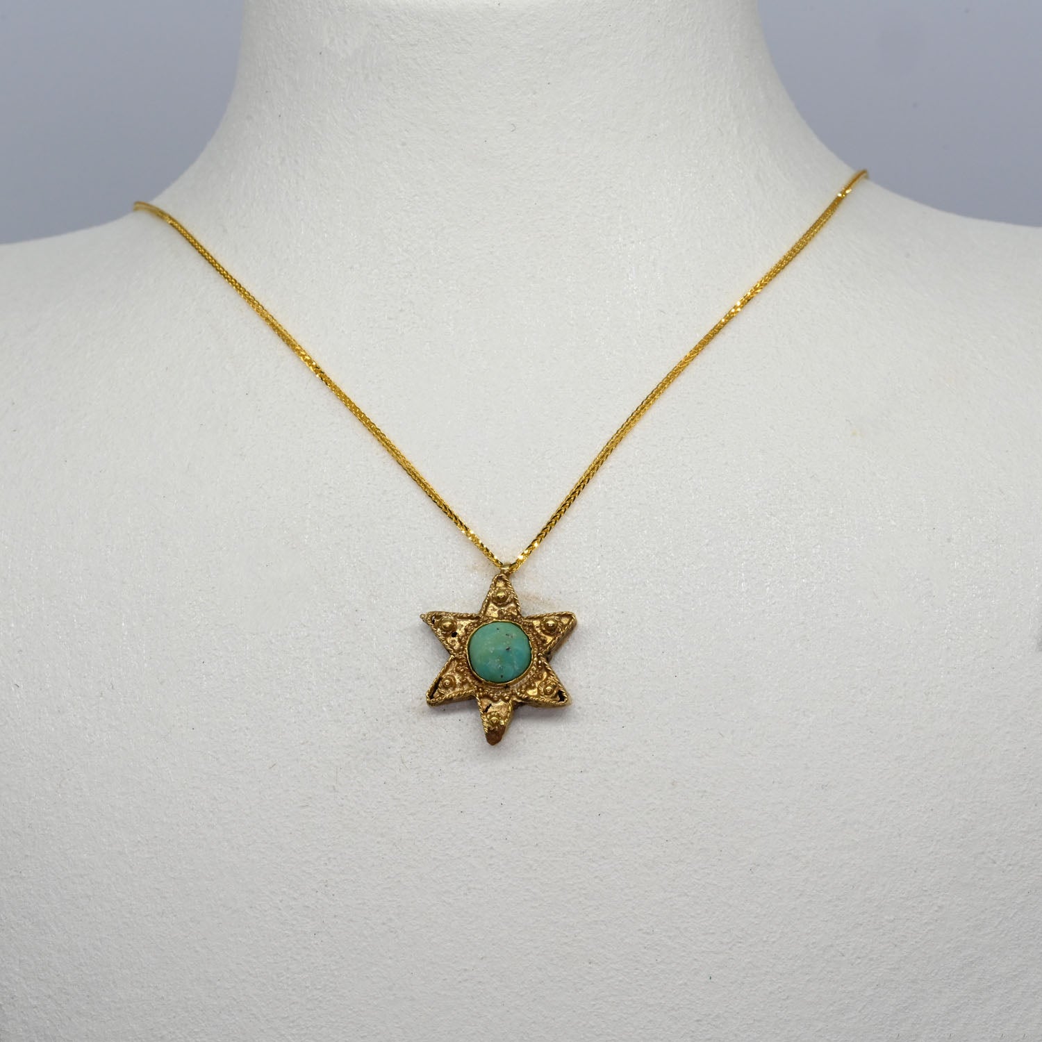 An Early Islamic Gold Seal of Solomon Pendant with Turquoise Inlay, Umayyad–Early Abbasid Period, ca. 7th–9th century CE