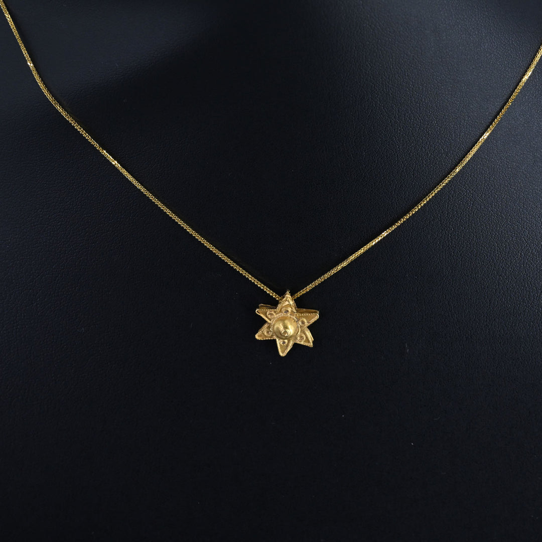 A Byzantine Gold Star Pendant, Eastern Mediterranean, ca. 6th–8th century CE