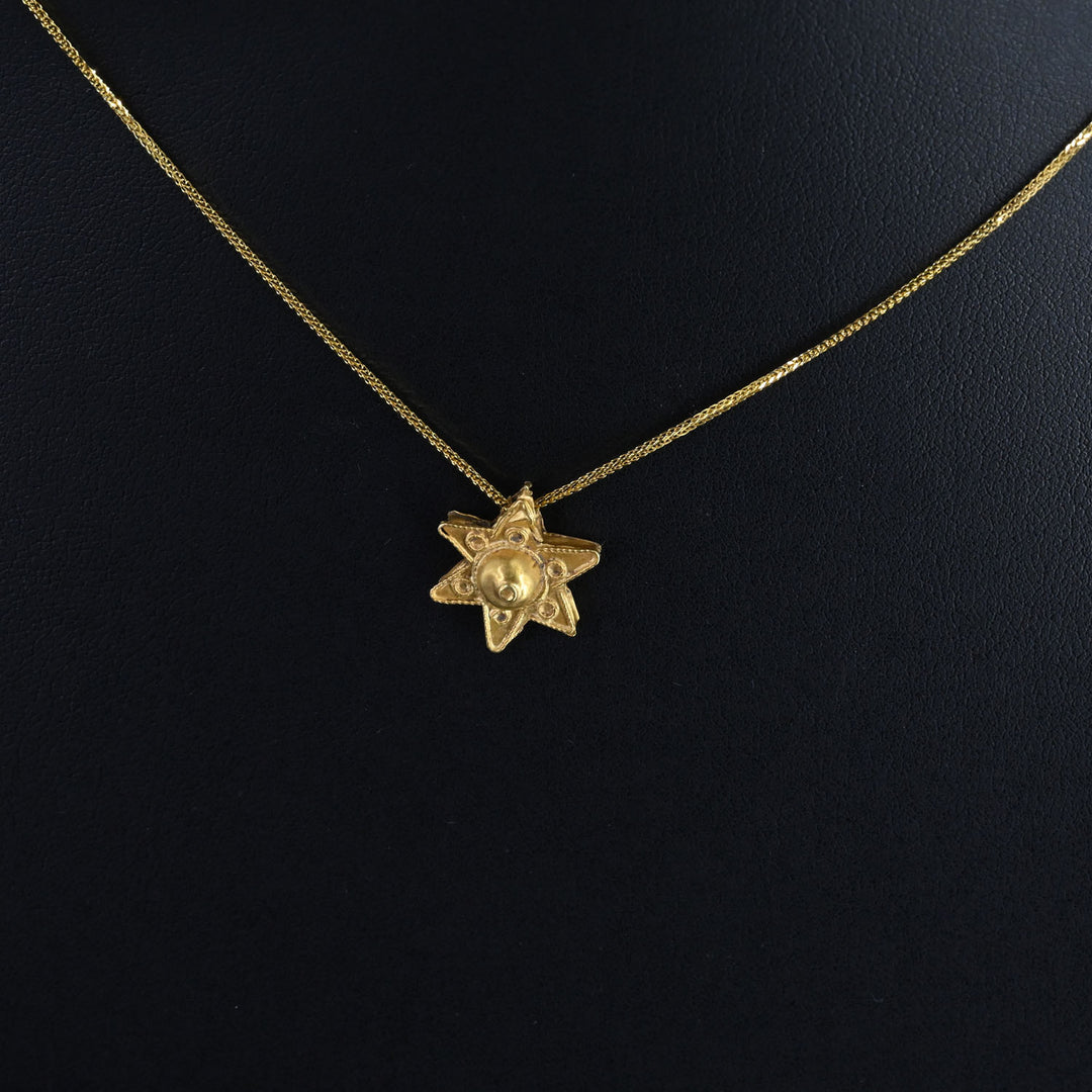 A Byzantine Gold Star Pendant, Eastern Mediterranean, ca. 6th–8th century CE