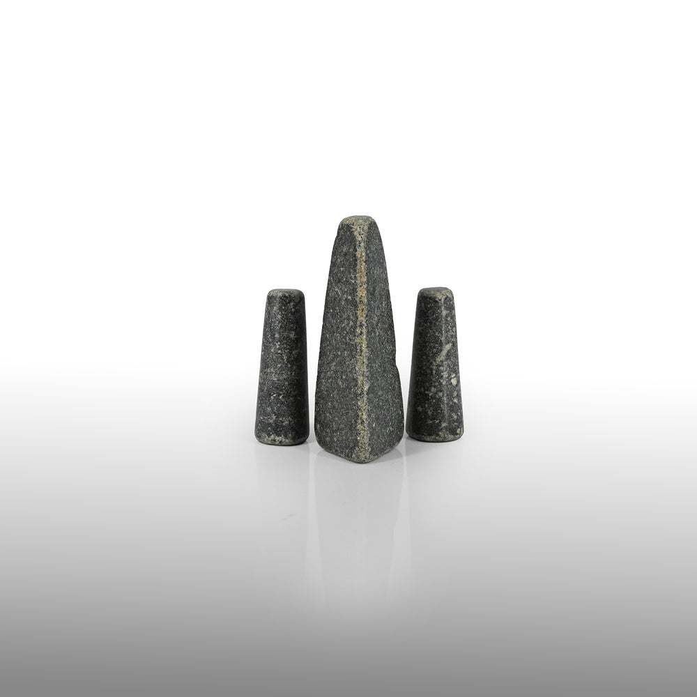 A set of three rare Sumerian Granite Gaming Pieces, Early Bronze Age, ca. 3100 - 2200 BCE