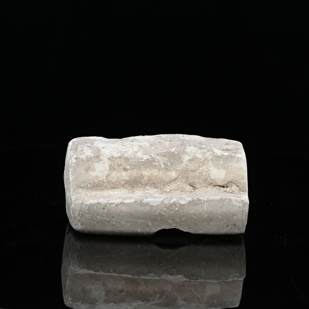 A Holy Land Limestone Bread Stamp, ca. 1st - 3rd century CE