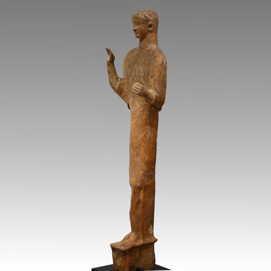 A large Phoenician terracotta standing youth, Neo Assyrian Period, ca. 6th century BCE