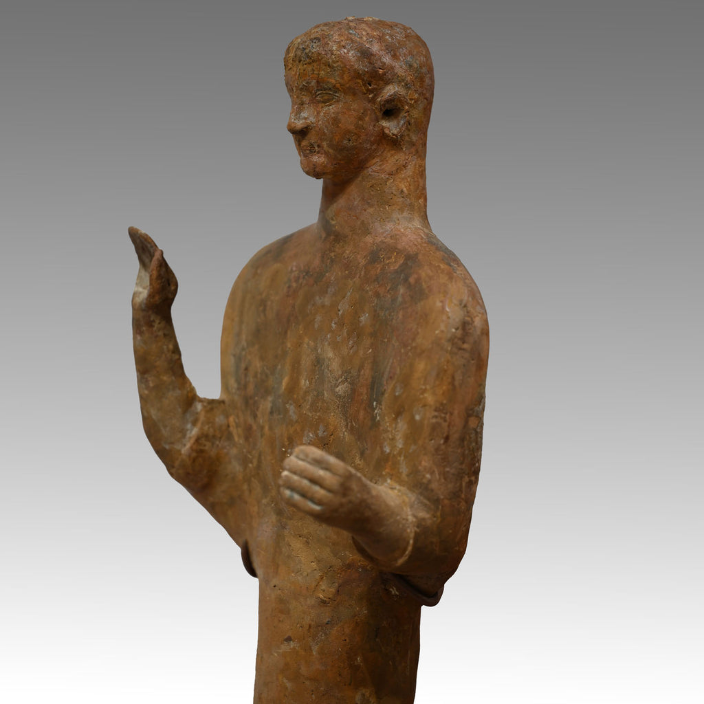 A large Phoenician terracotta standing youth, Neo Assyrian Period, ca. 6th century BCE