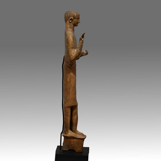 A large Phoenician terracotta standing youth, Neo Assyrian Period, ca. 6th century BCE