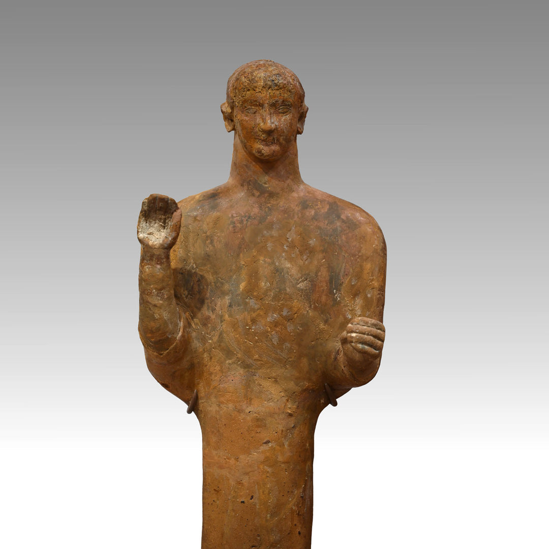 A large Phoenician terracotta standing youth, Neo Assyrian Period, ca. 6th century BCE
