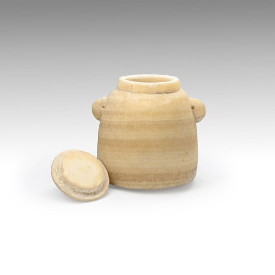 A Biblical "Beehive" Alabaster Jar and Lid, Hellenistic - early Roman Period, ca. 3rd century BCE - 1st century CE