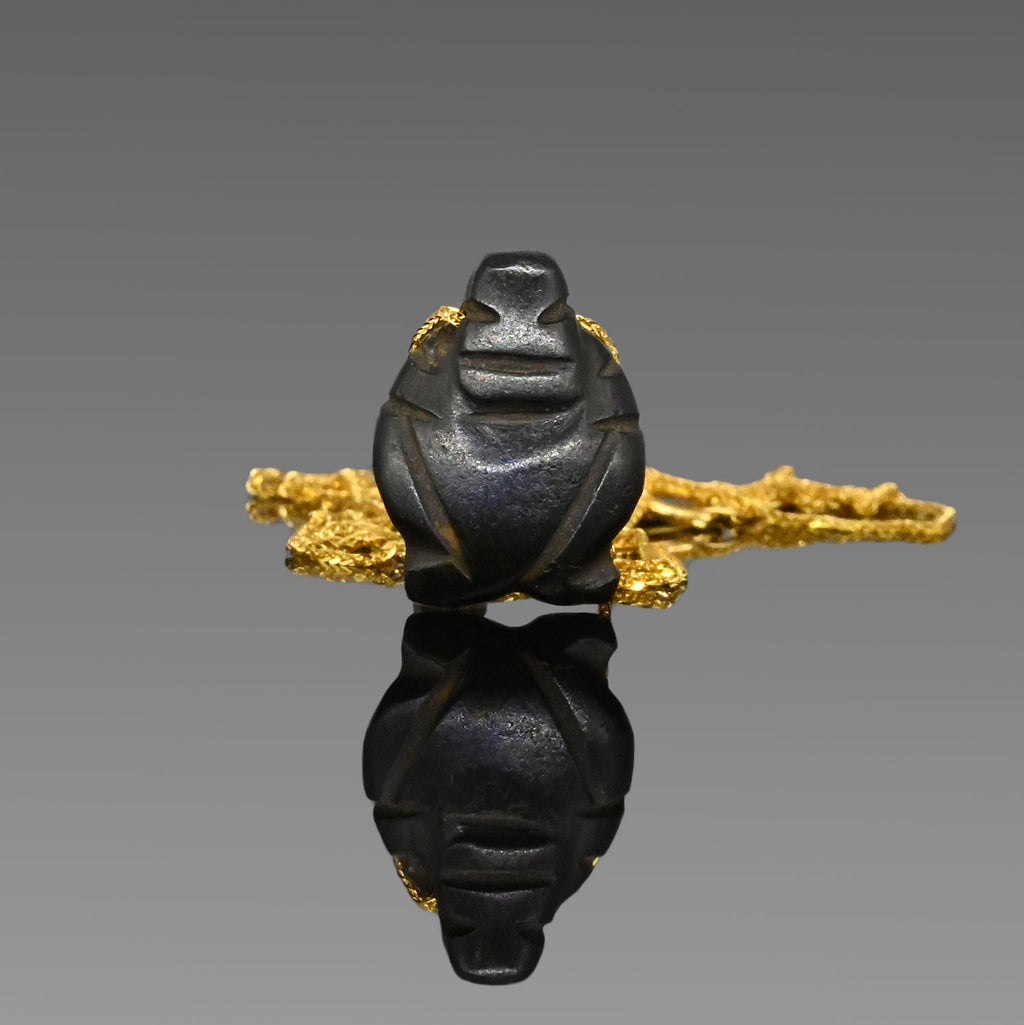 A Mezcala Serpentine Miniature Figure Pendant, Pre-Classic Period, ca. 300 - 100 BCE