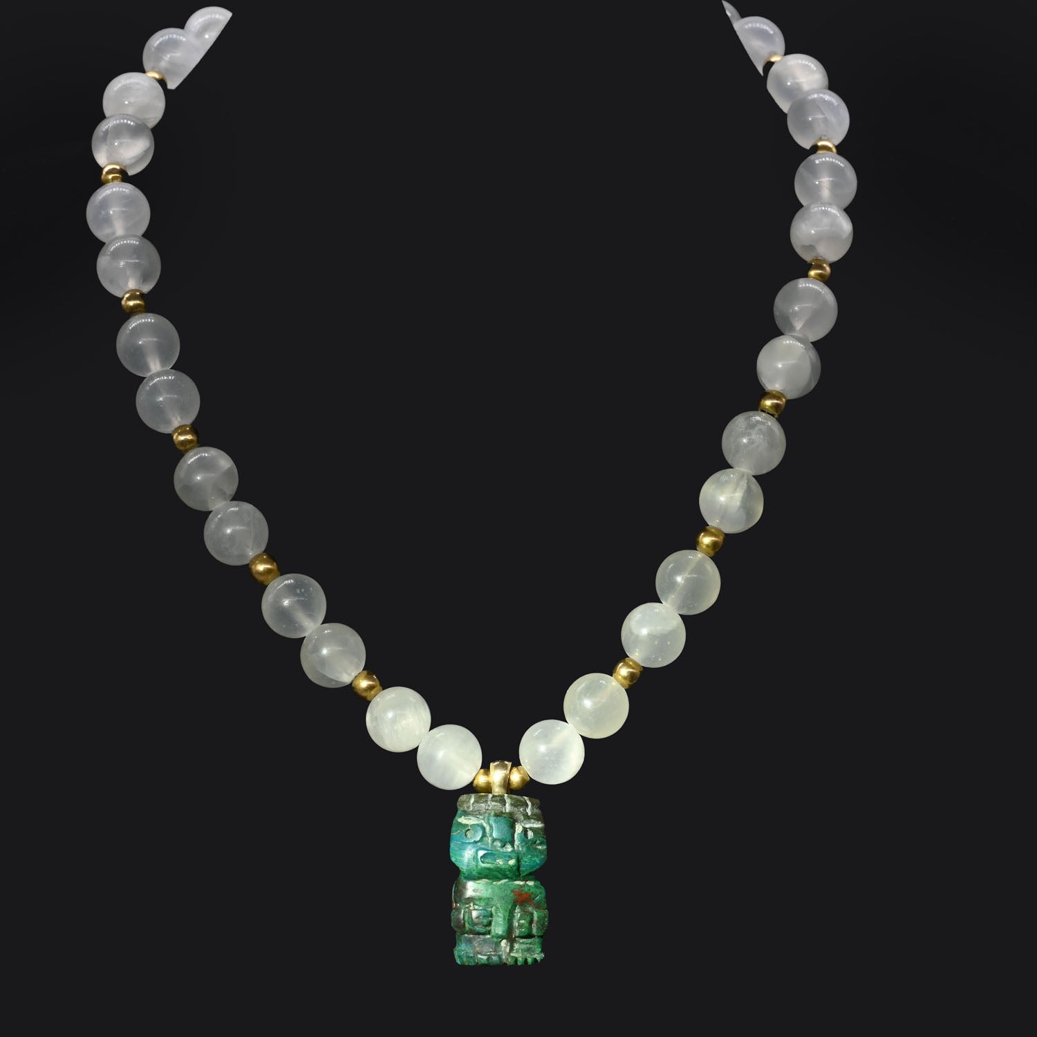 A Chimu-Inca Chrysocolla Pendant, ca. 800 - 1425 CE