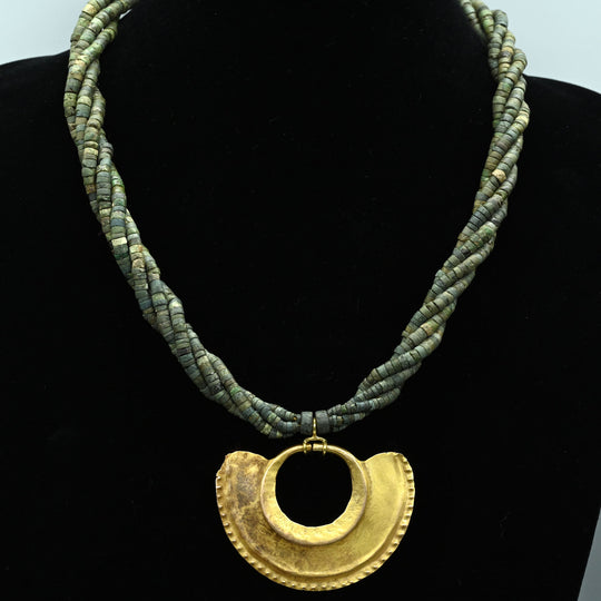 A Sinu Gold Nosering on Beaded Necklace, ca. 800 - 1500 CE