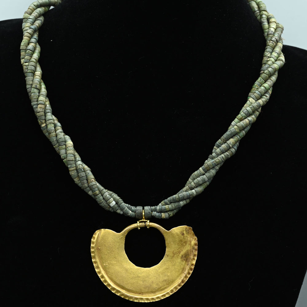 A Sinu Gold Nosering on Beaded Necklace, ca. 800 - 1500 CE