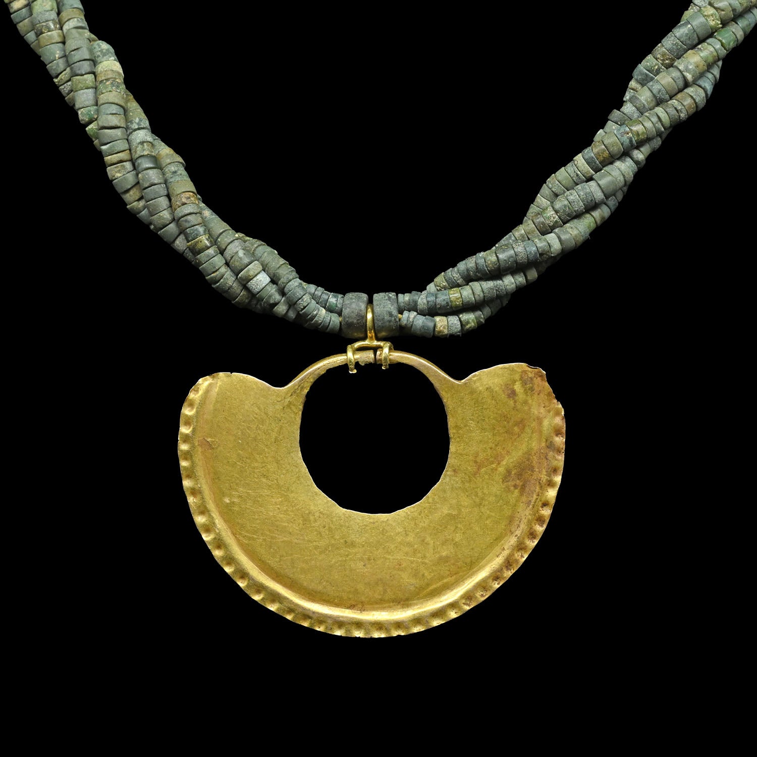 A Sinu Gold Nosering on Beaded Necklace, ca. 800 - 1500 CE