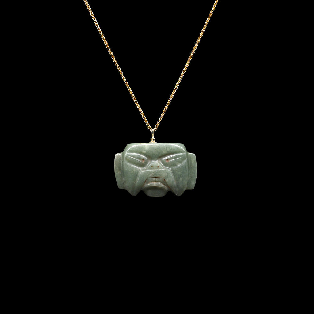 An Olmec Jade Were-jaguar Mask Amulet, Middle Preclassic Period, ca 900 - 600 BCE