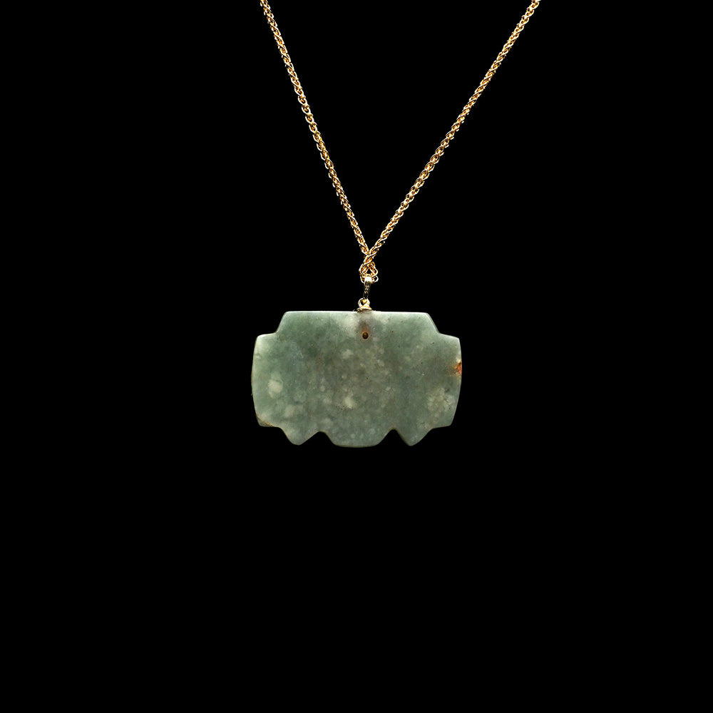 An Olmec Jade Were-jaguar Mask Amulet, Middle Preclassic Period, ca 900 - 600 BCE