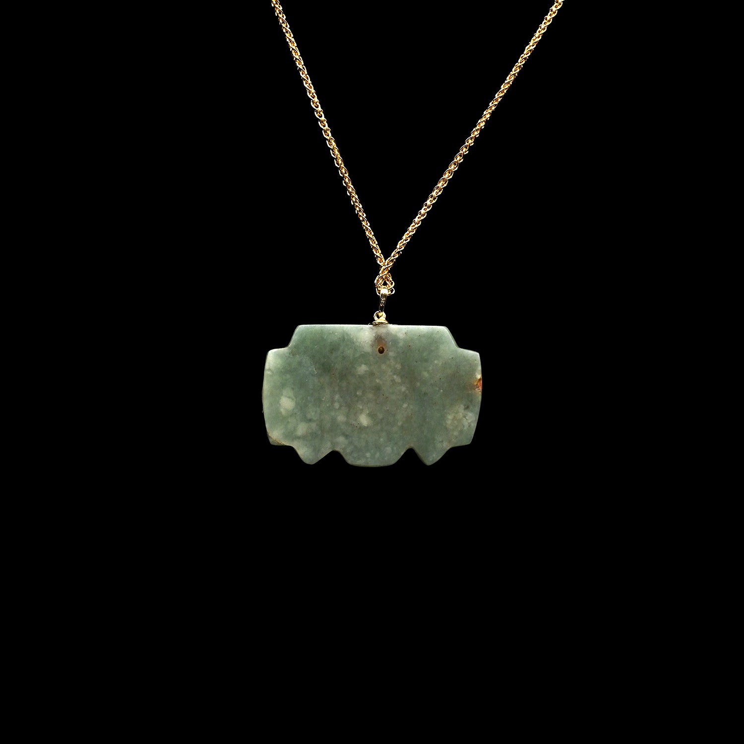 An Olmec Jade Were-jaguar Mask Amulet, Middle Preclassic Period, ca 900 - 600 BCE