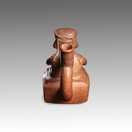 A Moche Terracotta Stirrup-Spout Vessel Depicting a Seated Dignitary, Moche II, ca. 300 - 500 CE