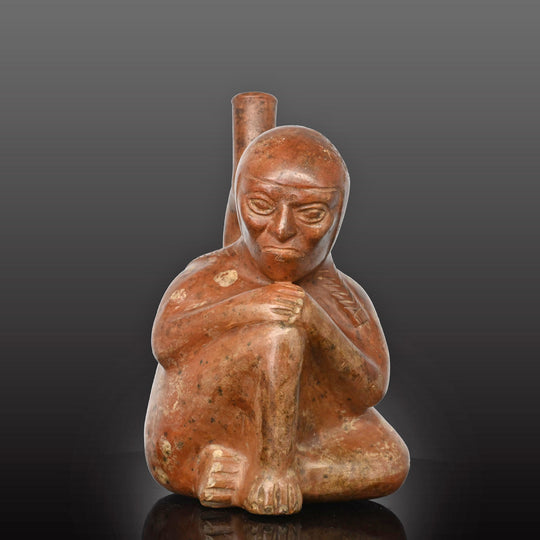 Moche stirrup-spout figural bottle depicting a woman, ca. 300 - 500 CE