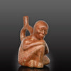 Moche stirrup-spout figural bottle depicting a woman, ca. 300 - 500 CE