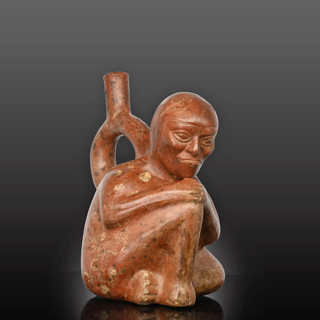 Moche stirrup-spout figural bottle depicting a woman, ca. 300 - 500 CE