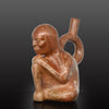 Moche stirrup-spout figural bottle depicting a woman, ca. 300 - 500 CE