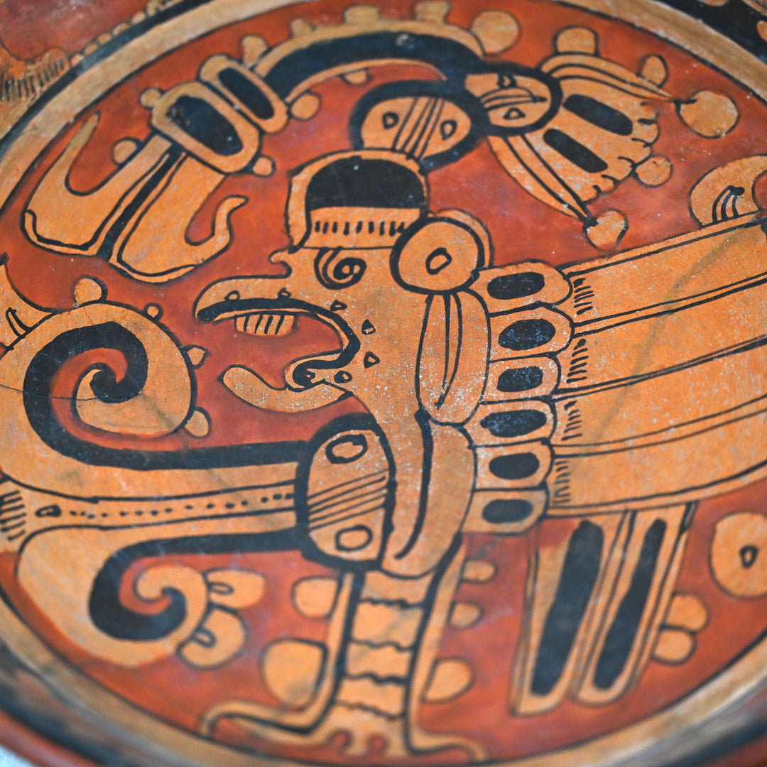 A Published Maya Polychrome Tripod Plate with Muan Bird Deity, Classic Period, ca. 500 - 800 CE