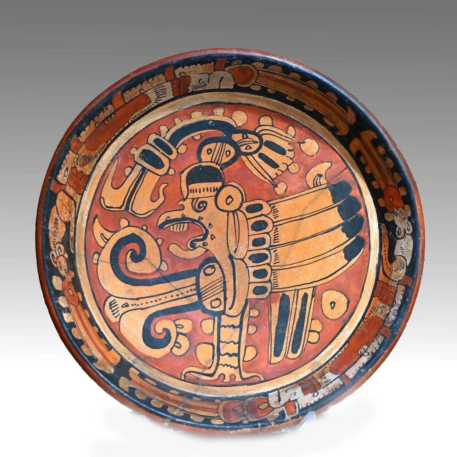A Published Maya Polychrome Tripod Plate with Muan Bird Deity, Classic Period, ca. 500 - 800 CE
