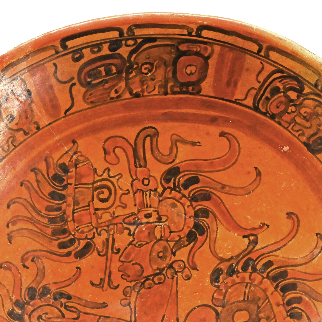 A Large Published Maya Polychrome Plate with Rim Text, Classic Period, ca. 7th – 8th century CE