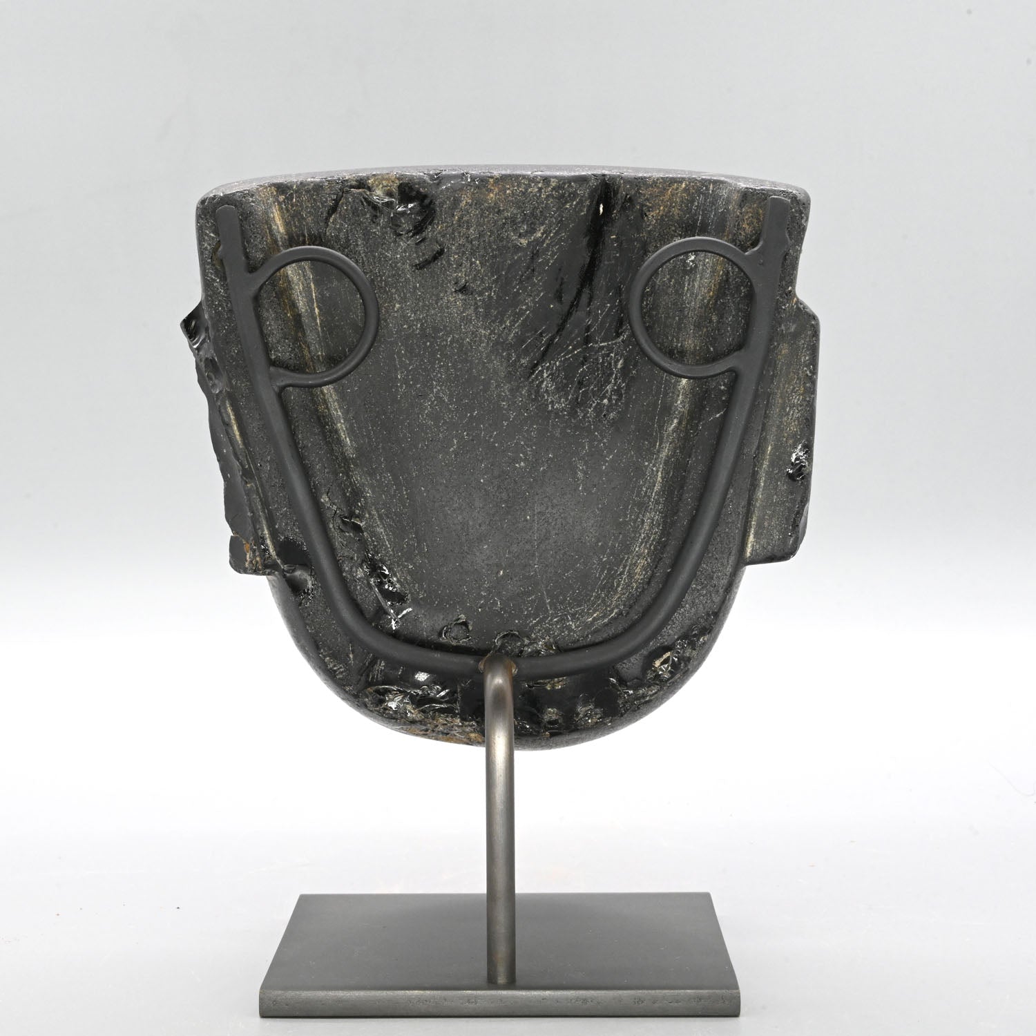 A fine Teotihuacan Obsidian Stone Mask, Early Classic Period, ca. 450 - 650 CE