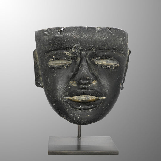 A fine Teotihuacan Obsidian Stone Mask, Early Classic Period, ca. 450 - 650 CE