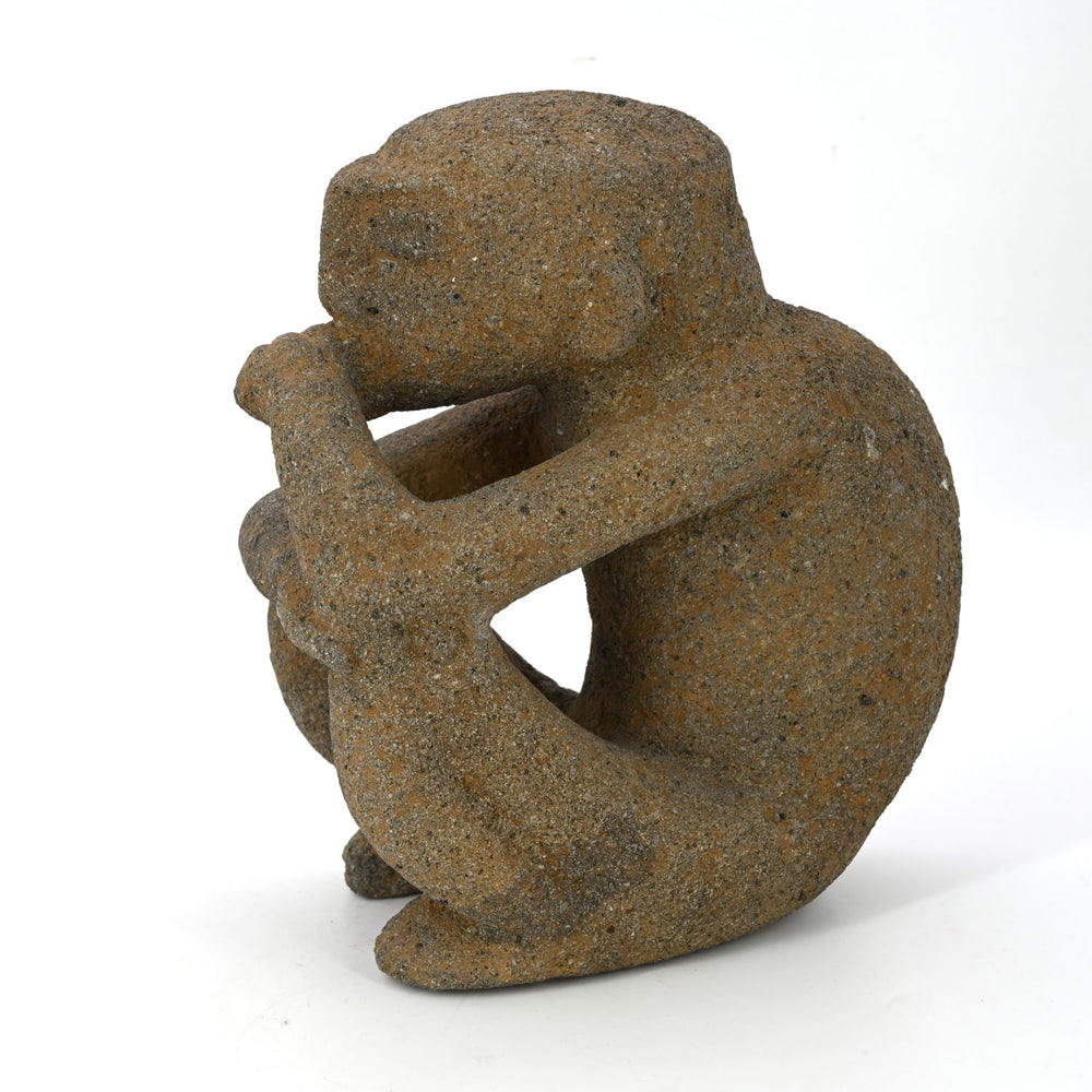 A Costa Rican Stone Sukia Figure shown smoking, ca. 500 - 1000 CE