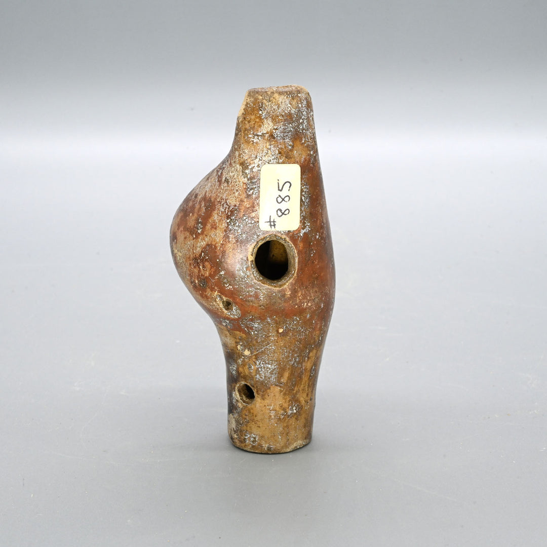 A Narino Pottery Shell Form Ocarina, Classic Period, ca. 500 - 1000 CE