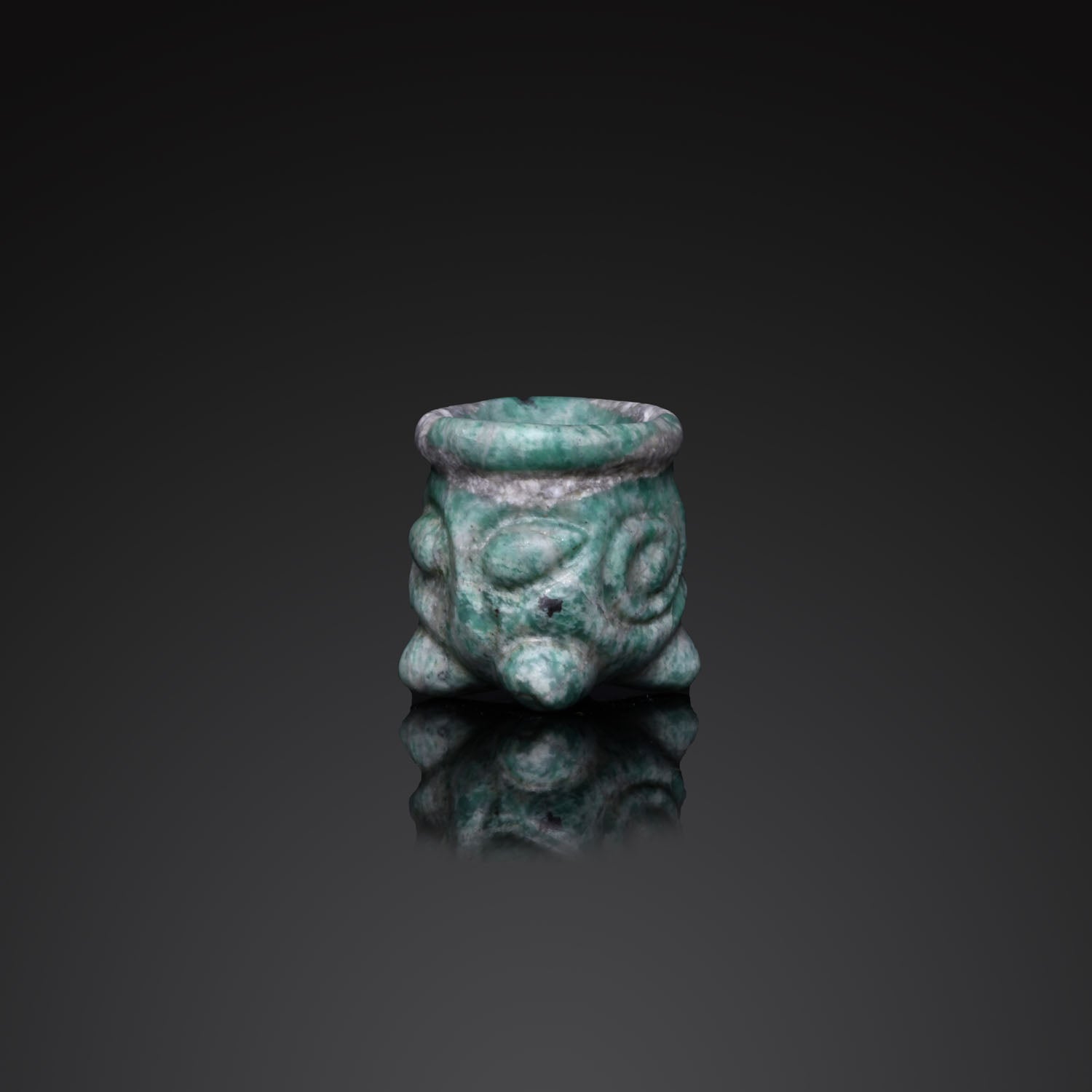 A rare Mayan Miniature Jade Votive Vessel, Classical Period, ca. 550 - 950 CE
